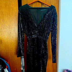 Black sequin midi length dress; never been worn